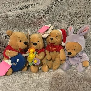 9 count Winnie the Pooh and Eeyore stuffies lot